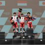 Pebalap Astra Honda Kiandra Ramadhipa (Tengah) berhasil meraih podium pertama pada race kedua di ajang Idemitsu Asia Talent Cup (IATC) 2024 seri pertama yang berlangsung Lusail International Circuit, Qatar (10/3) (Asia Talent Cup).