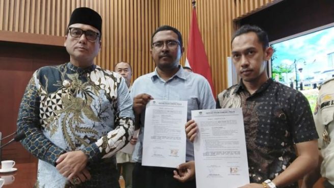 Permohonan maaf usai viral bagi-bagi bir di acara Pocari Sweat Run 2025 (TribunJabar).